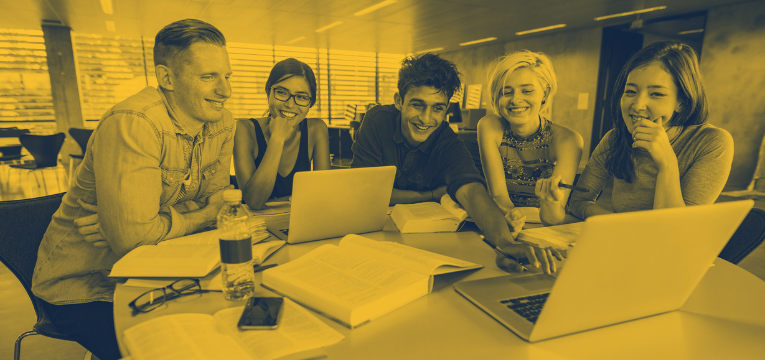 student services graphic students looking at laptops and smiling