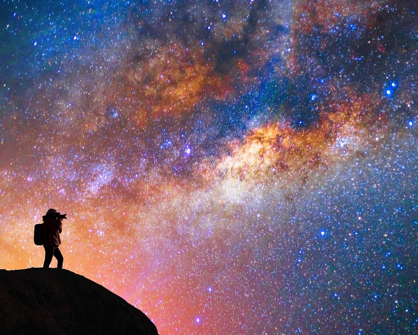 night sky with a silouette of a man