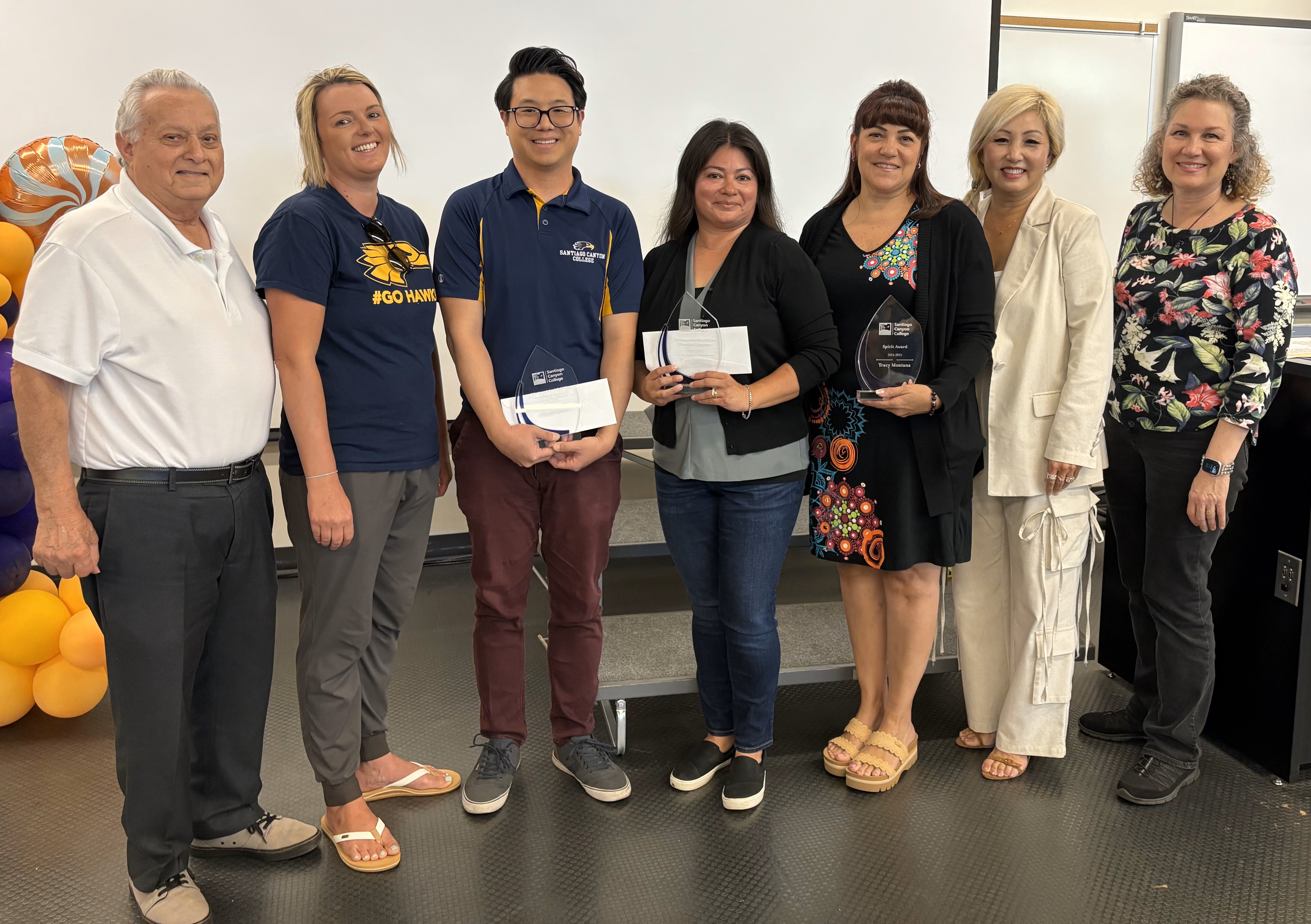 classified award winners with school president