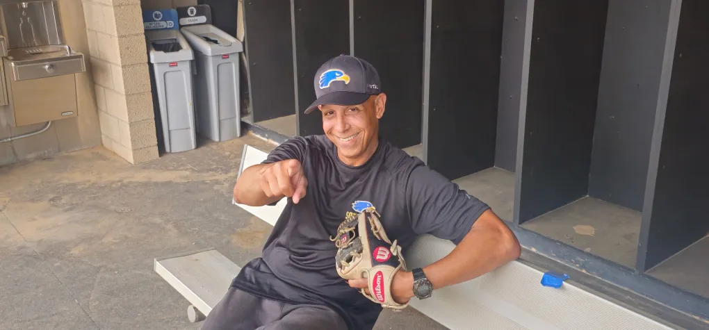 softball coach louis simon